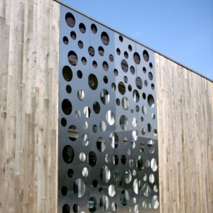 Poinçonnage habillage façade